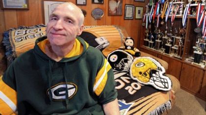Jim Gregg's home in Pittsburgh's Greenfield neighborhood is a shrine to the basketball and baseball players he has coached at St. Roselia School. He coached Green Bay Packers head coach Mike McCarthy, who played on the school's Pittsburgh Catholic Diocese championship basketball team in 1975, and his decor is now split between the Steelers and Packers.