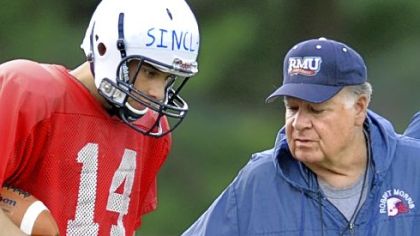 Robert Morris University quarterback Jeff Sinclair, a Highlands High School graduate, talks to head coach Joe Walton during a recent practice.