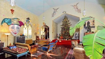 The former sanctuary is now a large open living space, with the old altar making home for a huge Christmas tree.