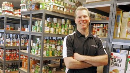 Beaver Area schools food director Ryan Wilson volunteers at North Hills Community Outreach food bank in Allison Park.