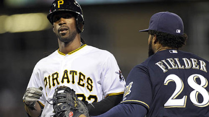 The Pirates' Andrew McCutchen is caught stealing by Brewers first baseman Prince Fielder in the fourth inning of Thursday's game at PNC Park.