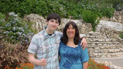 Kevin Kammerdiener stands with his mother, Leslie, in November 2009. Ms. Kammerdiener has been providing daily 24-hour care for her son since a suicide bomber nearly killed him in Afghanistan in 2008.