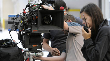 The IMAX camera is prepared for a shot along Oliver Avenue as Batman films in Downtown Pittsburgh.