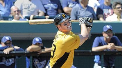 Matt Diaz hits a home run Monday against the Rays at McKechnie Field in Bradenton, Fla.