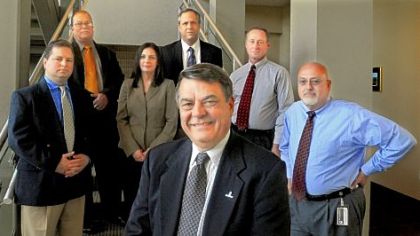 GAI Consultants CEO Gary M. DeJidas (foreground) with David Mollish, Ray Sutherland, Jennifer Broucsh, Stephen Gould, Karl Palvisak and Harry Trout. All are graduates of the mobile MBA program at Point Park University.