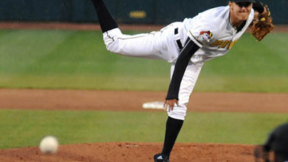West Virgnia Power pitcher Jameson Taillon delivers a pitch to Hagerstown's Bryce Harper in the first inning of Wednesday's game at Appalachian Power Park in Charleston, W.Va.