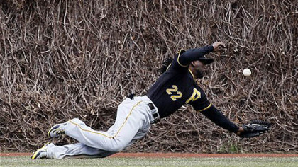 Andrew McCutchen, took a dive on the Wrigley Field grass.