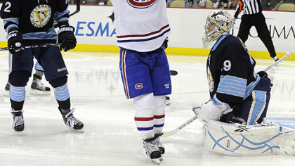 Canadiens forward Brian Gionta celebrates a goal by teammate Travis Moen in front of Penguins goaltender Marc-Andre Fleury and defenseman Matt Niskanen in the second period of Saturday's game at Consol Energy Center.