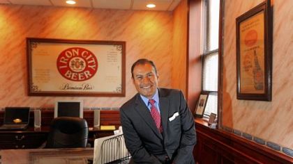 Edwin Lozano, president and CEO of the new Iron City beer operations, inside his office at the former Iron City Brewery in Lawrenceville.