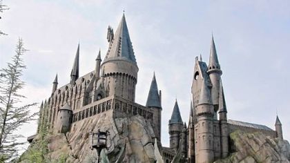 Universal Orlando's Wizarding World of Harry Potter is located in the Islands of Adventure. The castle is designed to look like Hogwarts School of Witchcraft and Wizardry, which houses the attraction Harry Potter and The Forbidden Journey, which includes a dizzying ride.
