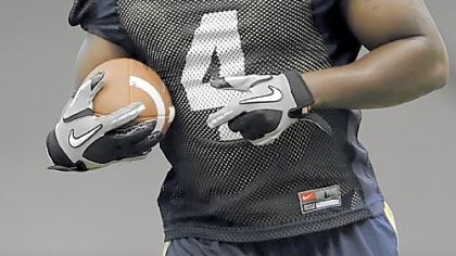 Pitt's Zach Brown carries as he works out at training camp Tuesday.