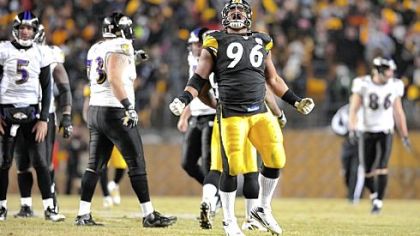 Ziggy Hood celebrates after sacking Baltimore quarterback Joe Flacco in the fourth quarter Saturday.