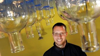 Owner Eric Meyer poses for a portrait in the under-construction Wigle Whiskey, a distillery in the 2400 block of Smallman Street in the Strip District.