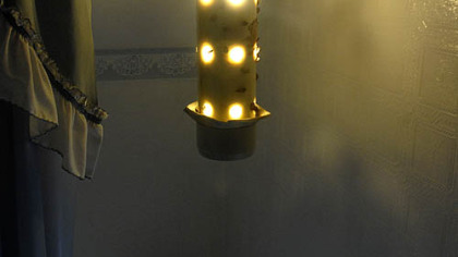 The Strube Stink Bug Trap hangs in a small bathroom in Doug Oster's Ross home. The first night the trap caught 10 bugs.