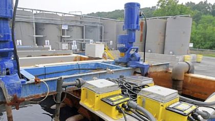 Frack treatment tanks at Advanced Waste Services in New Castle. The water flows through several compartments in the tank, then is stored in the tanks behind.