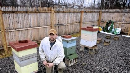 Steve Rapasky, director of the Burgh Bees community apiary on Susequanna Street, poses for a portrait inside the apiary Monday. Rapasky lives in Dormont.