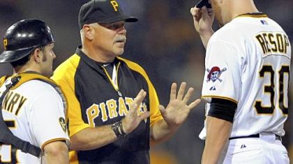 Ray Searage talks with Chris Resop, right, in a game Aug. 3 at PNC Park. Pirates players say Searage's message to each pitcher is different when he makes a mound visit. Starter James McDonald: "He knows what buttons to push for each guy."