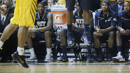 Travon Woodall and Pitt defeated Casey Mitchell and West Virginia, 71-66, at Morgantown, W.Va. Feb. 7.