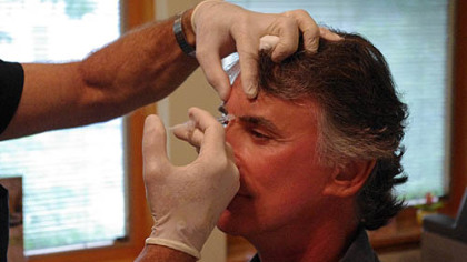 Danny Paranik, 64, of Beaver is injected with Botox by cosmetic surgeon Dominic A. Brandy in Scott Township.