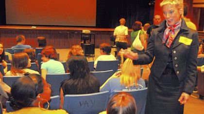 Patricia Ward Kelly talks to students involved with the production of the spring musical "Seussical" at West Mifflin High School.