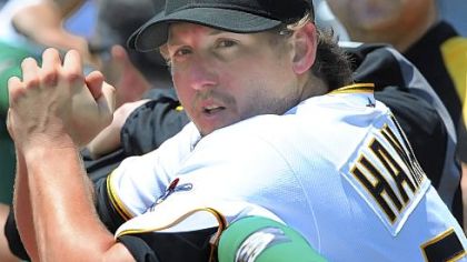 Joel Hanrahan, standing in the Pirates' dugout before the Cubs game Sunday at PNC Park, will be joined by center fielder Andrew McCutchen and pitcher Kevin Correia on the National League All-Star roster. It is the first All-Star selection for all three.