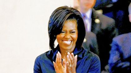 Michelle Obama wearing Sophie Thealiet.