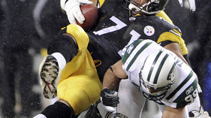 Flozell Adams is tackled by the N.Y. Jets' Jason Taylor after recovering a fumble by quarterback Ben Roethlisberger in December at Heinz Field.
