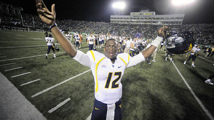 West Virginia quarterback Geno Smith threw 24 touchdown passes last season.