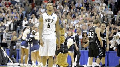 Gilbert Brown walks off the Verizon Center court in Washington after Pitt lost to Butler, 71-70, Saturday night.