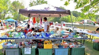 Open for business with a lot of glassware at the Tour-Ed Mine Flea Market