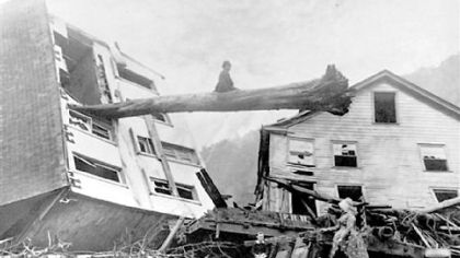 Johnstown Flood image (tree through house): Historic 1889 photo courtesy of Johnstown Area Heritage Association.