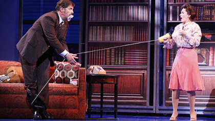 Joseph Mahowald as Mr. Hart and Mamie Parris as secretary Judy.