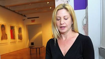 Rebecca Bloom, Intuitive Tarot Card Reader from Edgewood, selects cards at a recent Tailgate and Tarot Card Party at The Warhol.