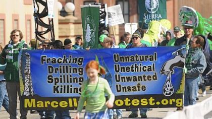A coalition opposed to Marcellus Shale gas drilling, including The Pittsburgh Sierra Club, Clean Water Action, Lincoln Place Action, Marcellus Protest, Peters Township Marcellus Shale Awareness Group and the Sierra Student Coalition, marches in the St. Patrick's day Parade, Downtown, Saturday.