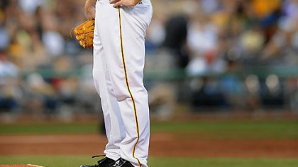 A dejected Ross Ohlendorf hangs his head after giving up seven runs Tuesday in the second inning.