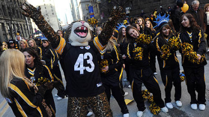 Thomas Jefferson High School's cheerleaders and mascot, a Jaguar dressed in a Troy Polamalu Jersey.