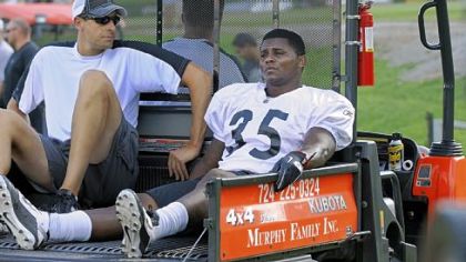 Barron Batch is taken off the field on a cart after an injury to his left knee at the end of practice Wednesday.