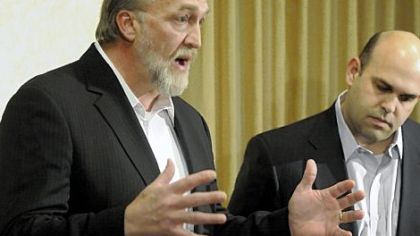 Scott Rotruck, left, vice president of corporate development for Chesapeake Energy Corp., talks about the fire at a well site in Washington County during a news conference Thursday in Canonsburg. Three workers were injured in the fire, which broke out Wednesday evening at the well site in Avella. At right is Matt Sheppard, senior director of corporate development for Chesapeake Energy.