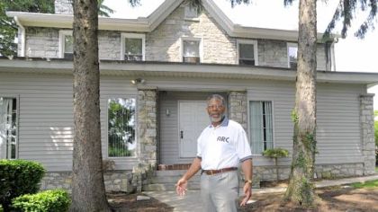 Daniel Elby, CEO of Alternative Rehabilitation Communities, outside the A.R.C. Woodland home in Harrisburg.