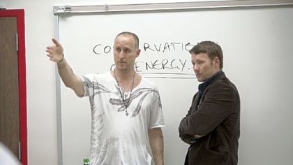 Director/writer/producer Gavin O'Connor (left) with Joel Edgerton  on the set of "Warrior."