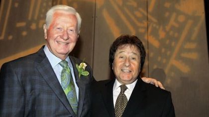 Real-estate developer Jack Piatt (left) with comedian Lonnie Shorr at a benefit event.