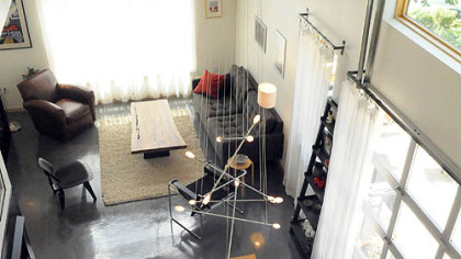 A view of the dining room and living room from the second floor.