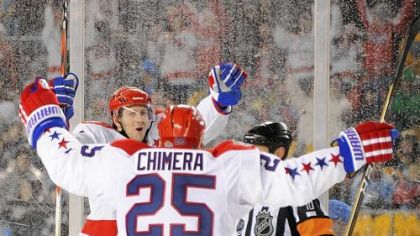 The Capitals' Eric Fehr scores his second goal of the Winter Classic in the third period agaist the Penguins at Heinz Field last night.