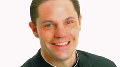 Rev. Tom Burke, who chased after the thief