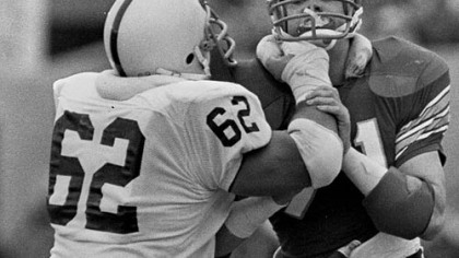 Penn State's Sean Farrell (62) mixes it up with Pitt's Bill Maas during the 1981 rivalry game between the two teams at Pitt Stadium. Penn State won, 48-14.
