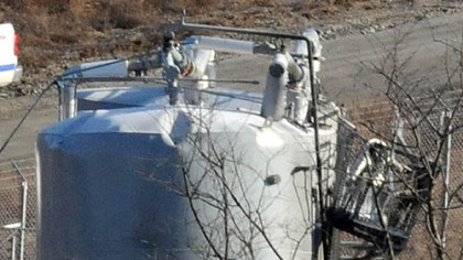 Closeup view of damage to a tank Tuesday morning at a MarkWest Liberty Midstream Resources LLC compressor station at a Marcellus well site in Mount Pleasant, Washington County.