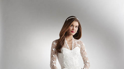 A V-neck wedding gown with Chantilly lace sleeves inspired by Kate Middleton's wedding dress will be available in July for $1,100 at Lord & Taylor and online at www.lordandtaylor.com.
