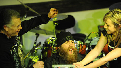 Steelers president Art Rooney was first in like to take a whack at Keisel's beard.