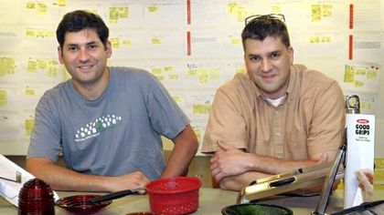Design manager Dino Mariano (left) and Randy Rossi, president of Bally Design, with some of their green products.