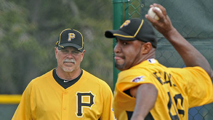 Pirates pitching coach Ray Searage watches the deliver of Jose Veras during recent workouts at Pirate City in Bradenton, Fla.
